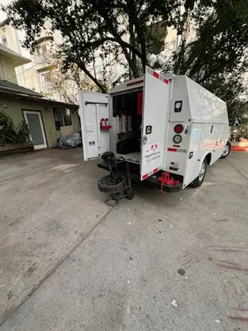 Magnet Plumbing service vehicle on-site for Slab Leak Repair in American Beauty Gardenhomes